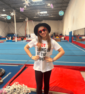 Alumni profile of Meagan Beffort, featuring a high-action gymnastics photo and a candid shot of her as a coach at the All Star facility, with a testimonial about her 10+ years in the sport.